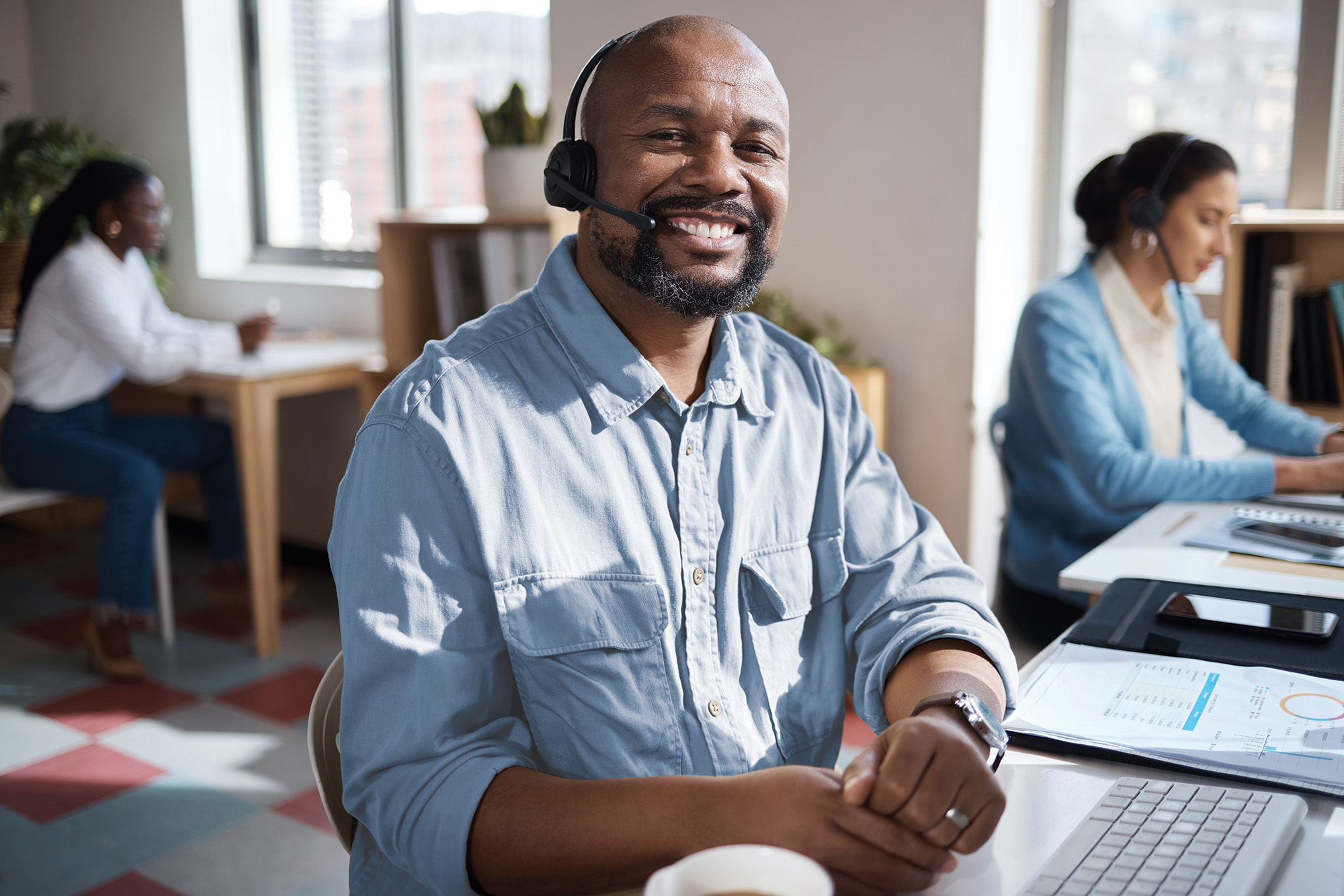 a call center worker sitting at a desk
